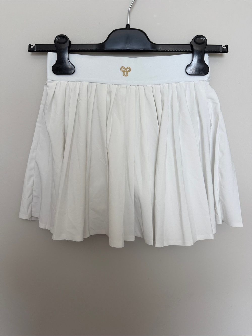 Aritzia White Pleated Skater Skirt with Gold Emblem